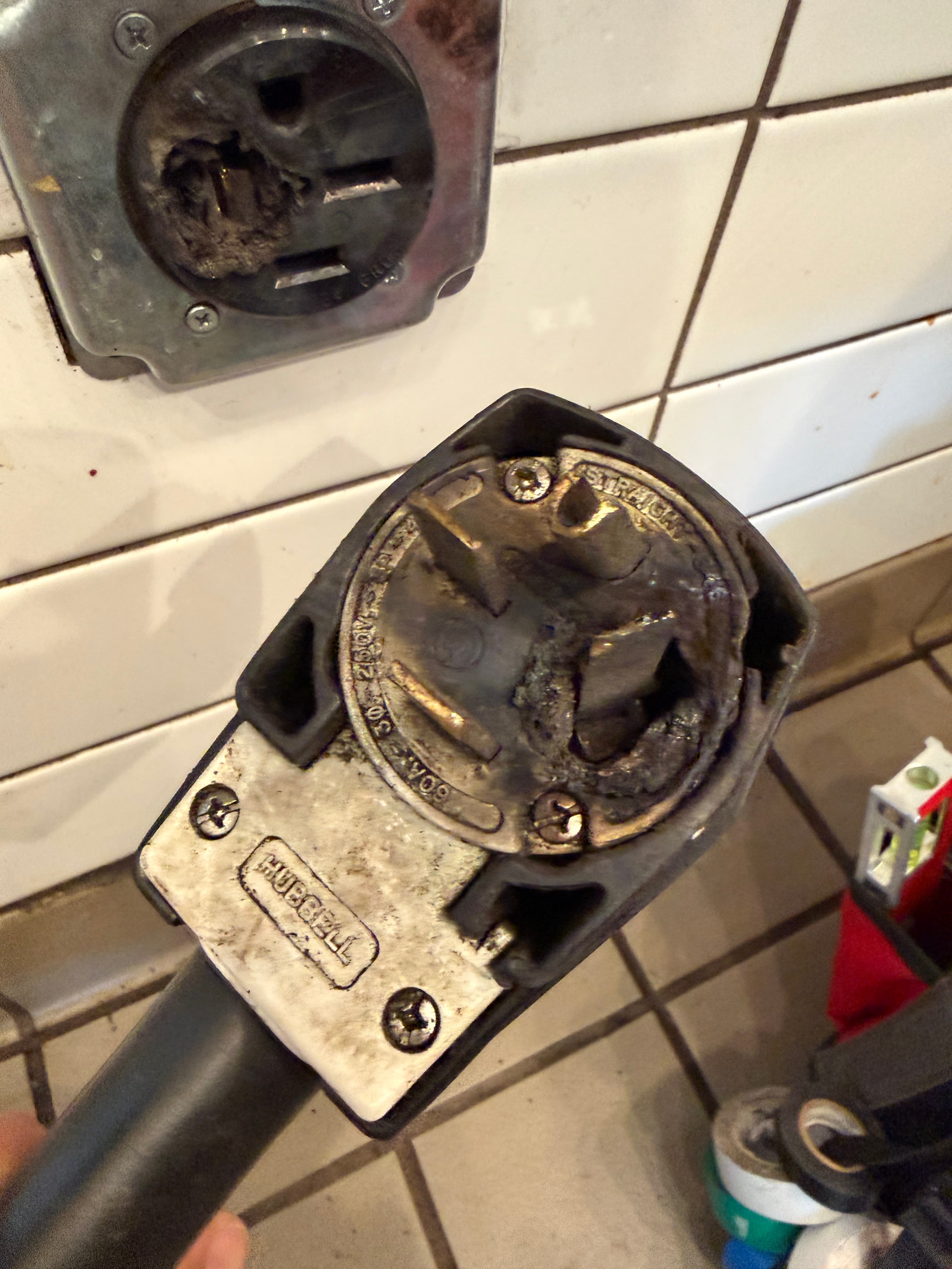 Burned commercial appliance plug and receptacle repaired in South Reno near Summit Sierra