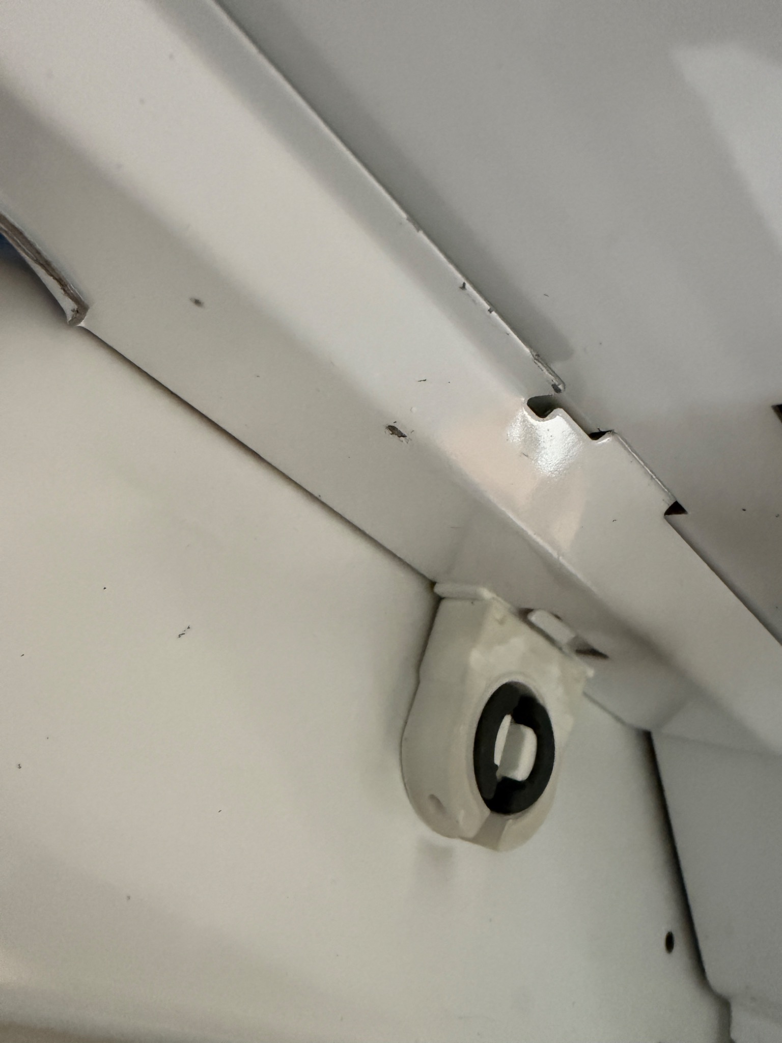 Replacement lamp holder installed inside a commercial light fixture in West Reno