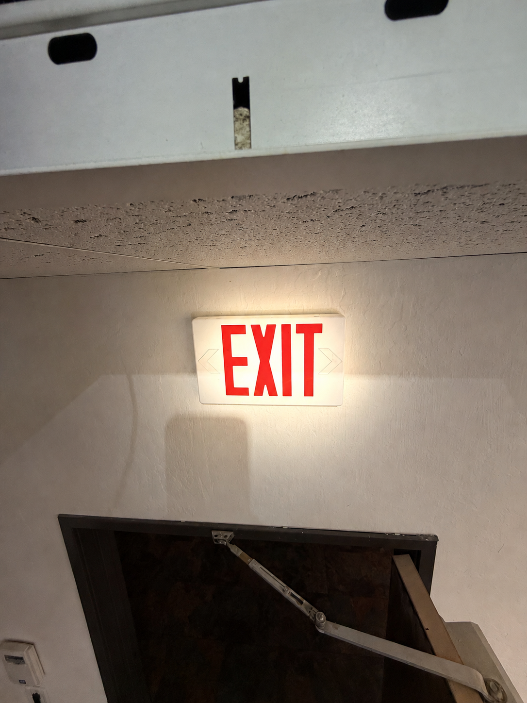 Commercial exit sign troubleshooting and electrical wiring repair completed in Reno, Nevada